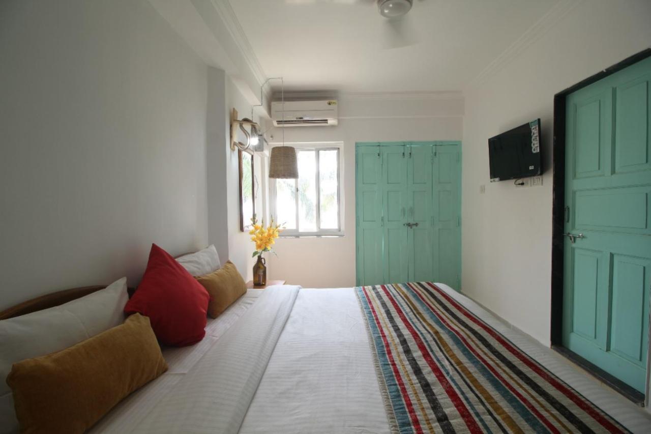 Hotel The Turquoiise House Morjim Esterno foto